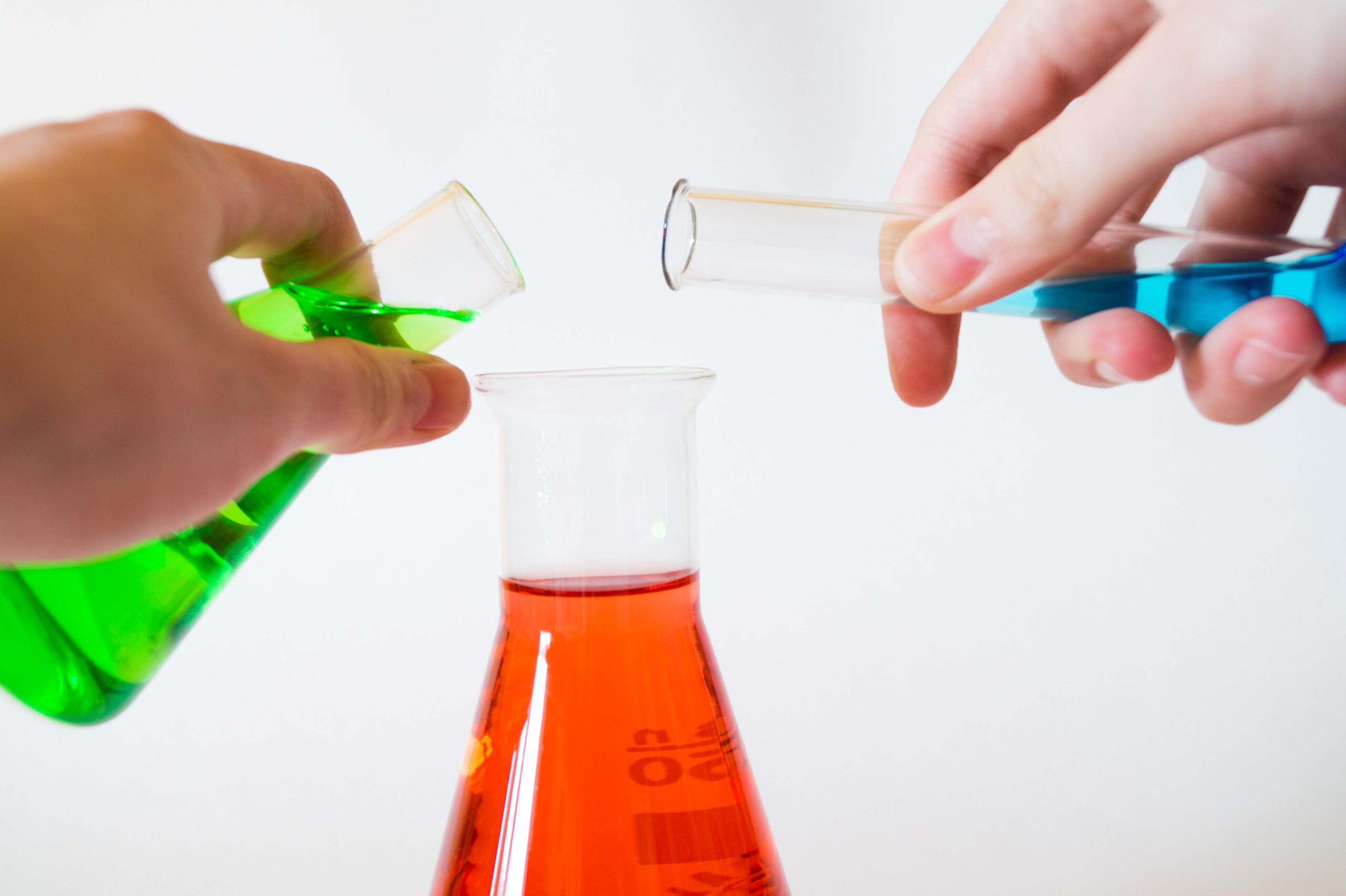 children playing with a science experiment